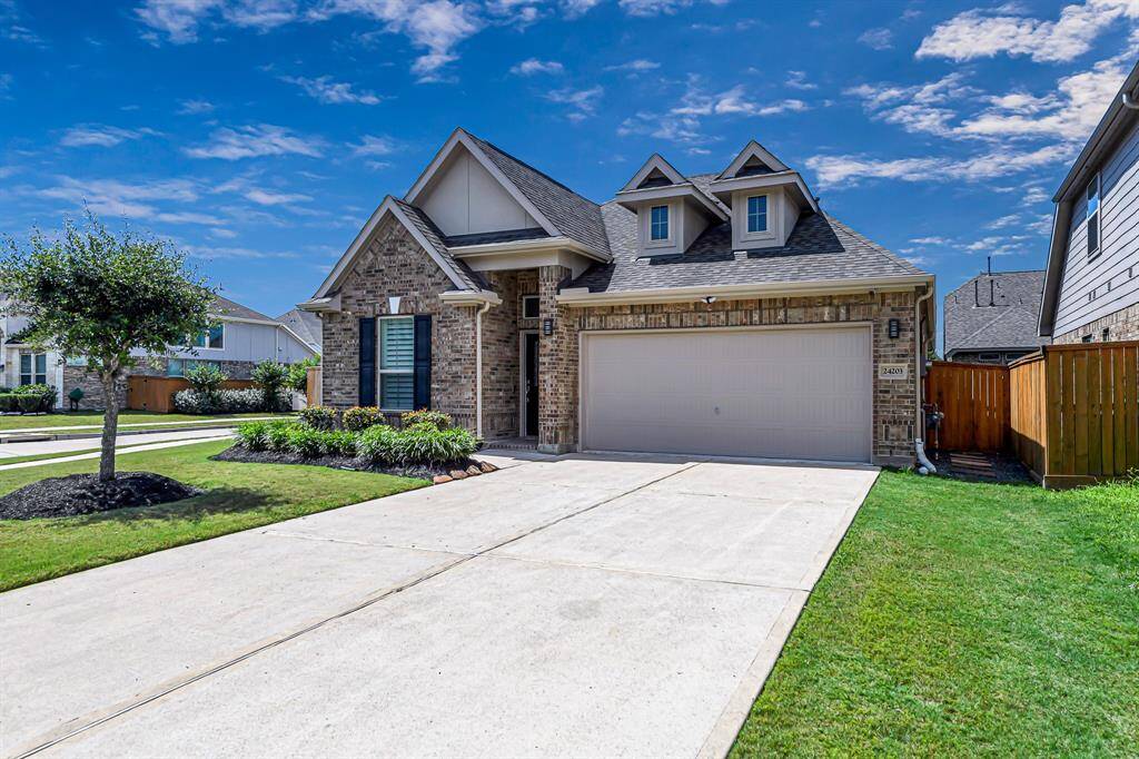 This home offers the convenience of a long double driveway, providing ample additional parking for guests, family, or extra vehicles. Whether you're hosting a gathering or simply need room to spread out, this spacious driveway adds everyday ease and functionality to an already impressive property.