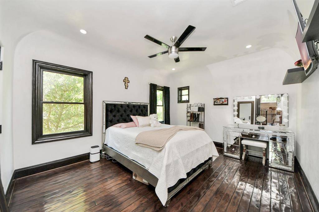 Spacious Bedroom #4 featuring a convenient Jack and Jill bathroom.