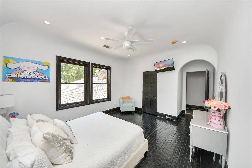 Spacious Bedroom #5 featuring a convenient Jack and Jill bathroom.