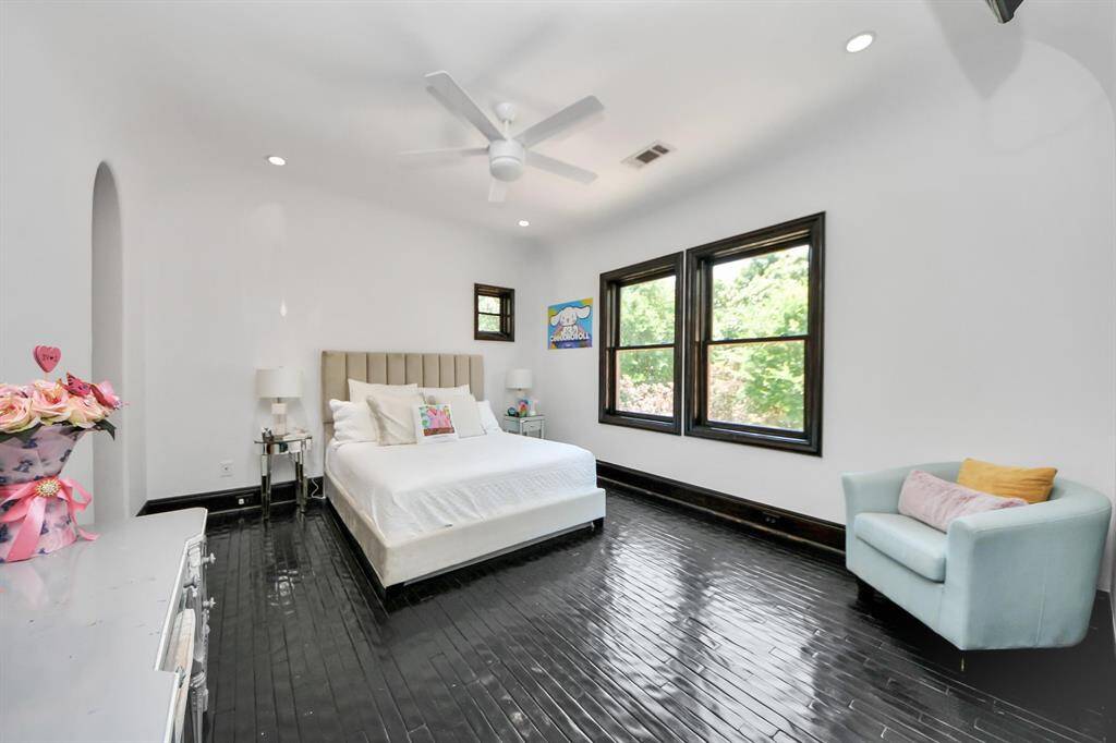 Spacious Bedroom #5 featuring a convenient Jack and Jill bathroom.
