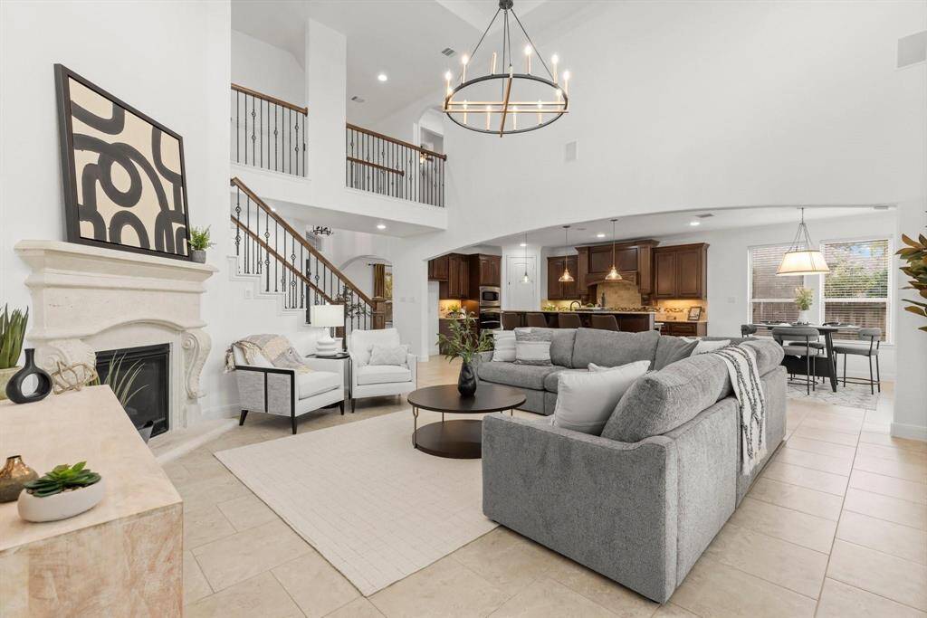 Beautiful fireplace, high ceilings, open concept