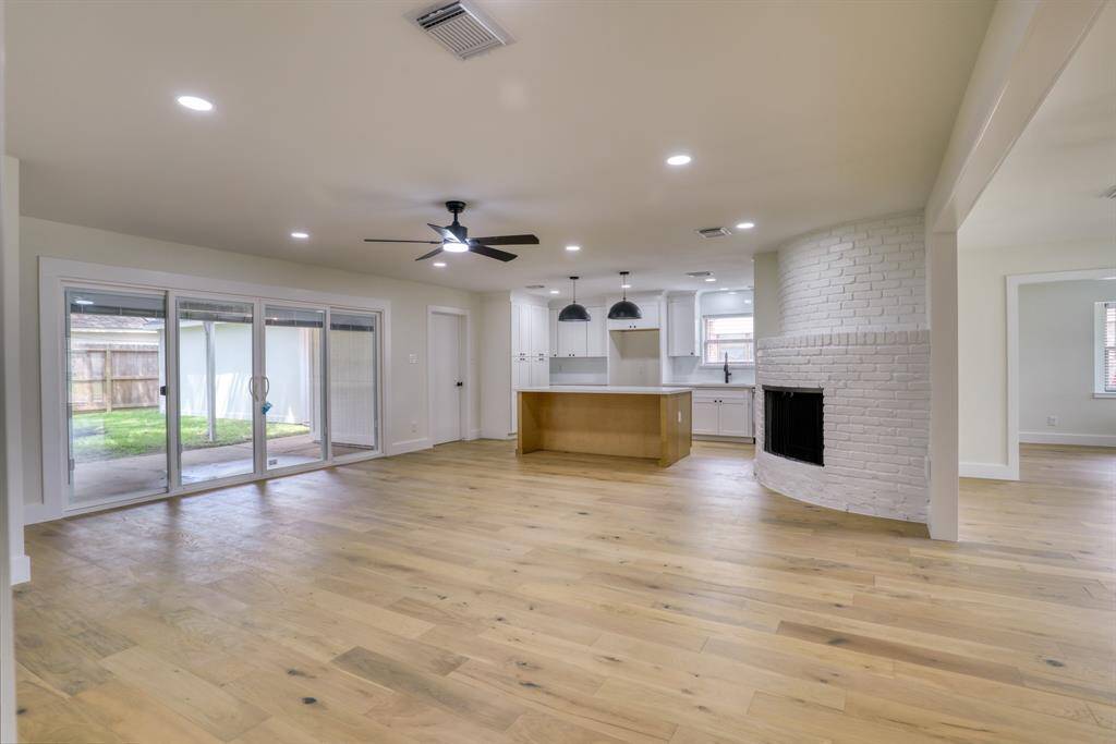 Open, light and bright is the ideal. Created with large sliding glass doors and warm, flowing hardwoods.