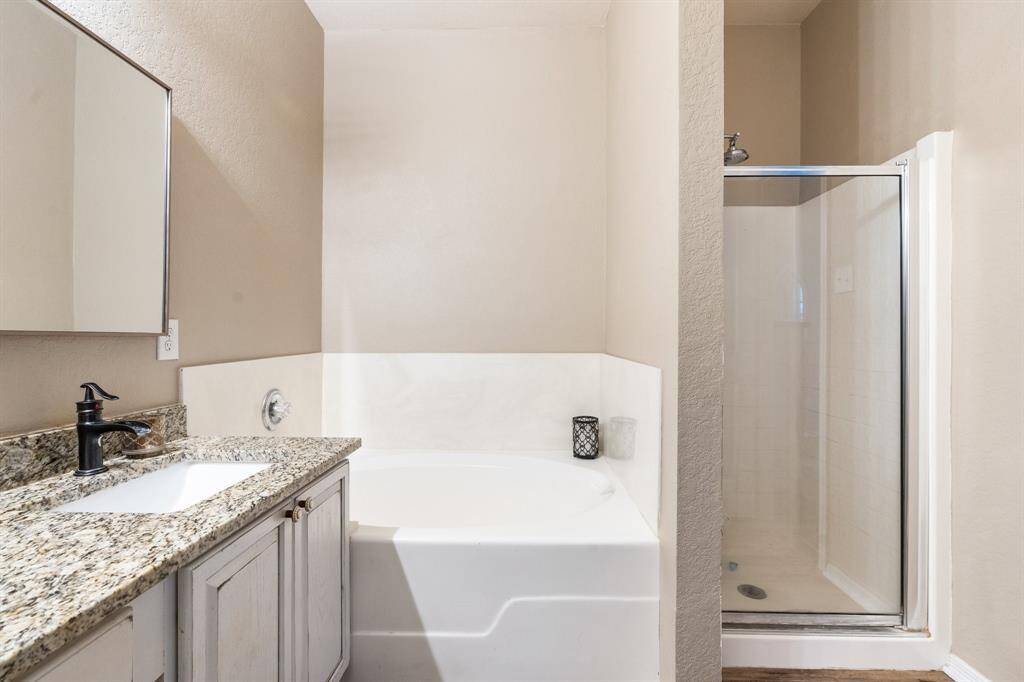 Large soaking tub & separate shower in primary bath