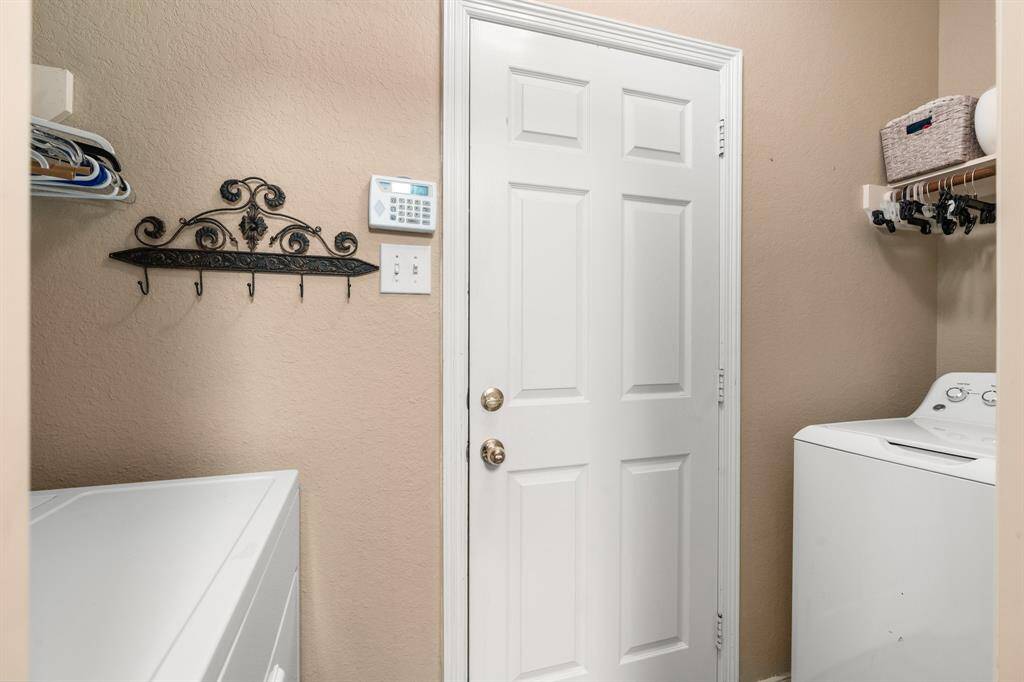 laundry room leading to garage