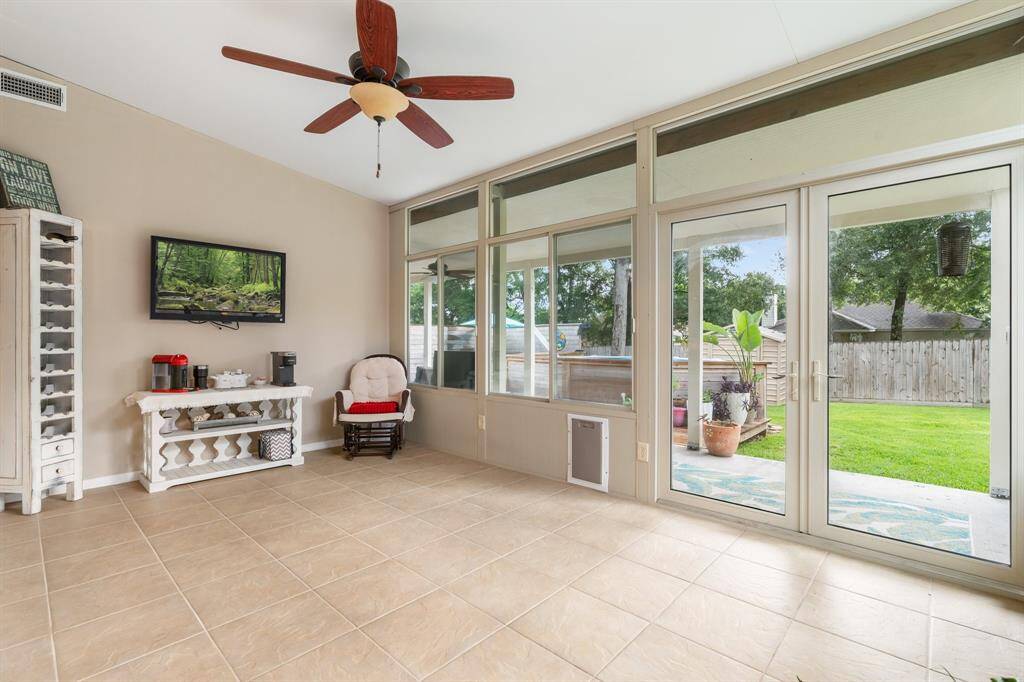 You'll love this additional sun room, great area for large table gatherings, cozy wine/ coffee room, work out room