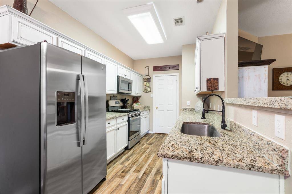 plenty of counter space in this galley style kitchen