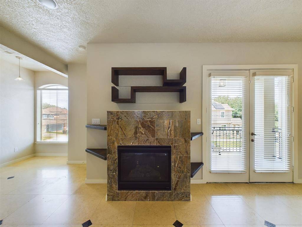 Gas Log Fireplace & Balcony