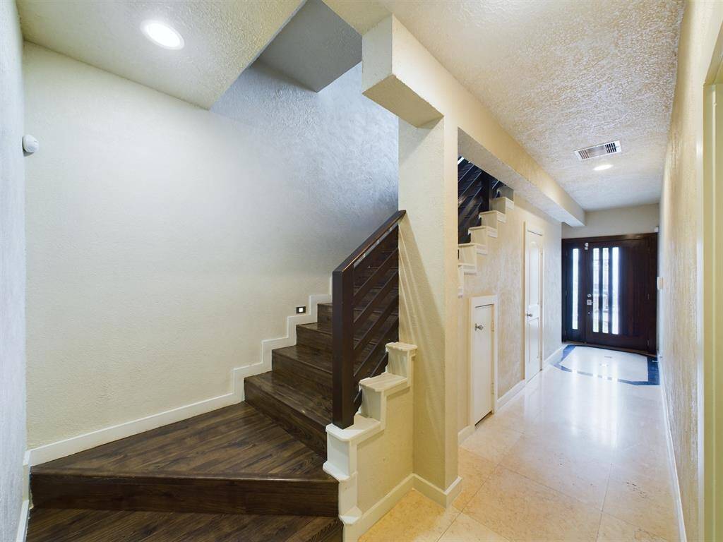 Bedroom, Full Bath and Utility room on First Level