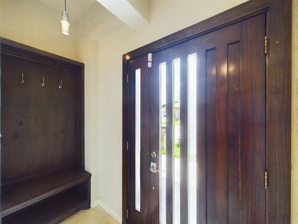 Foyer with Charming Shoe Bench & Full Bathroom