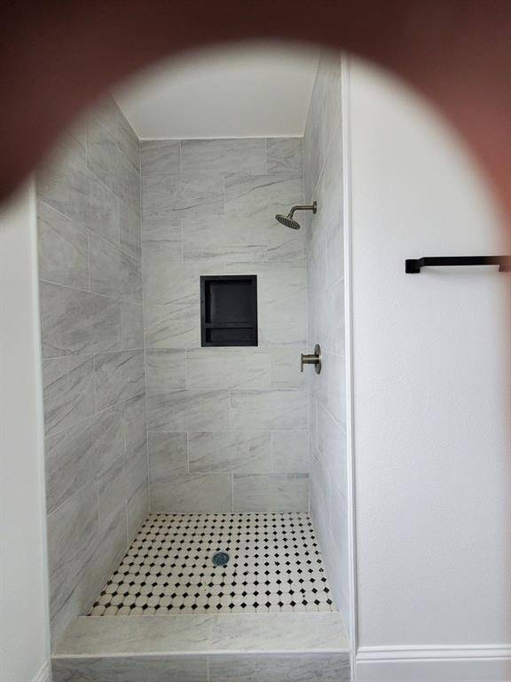 hallway with laundry to serve each bedroom conveniently