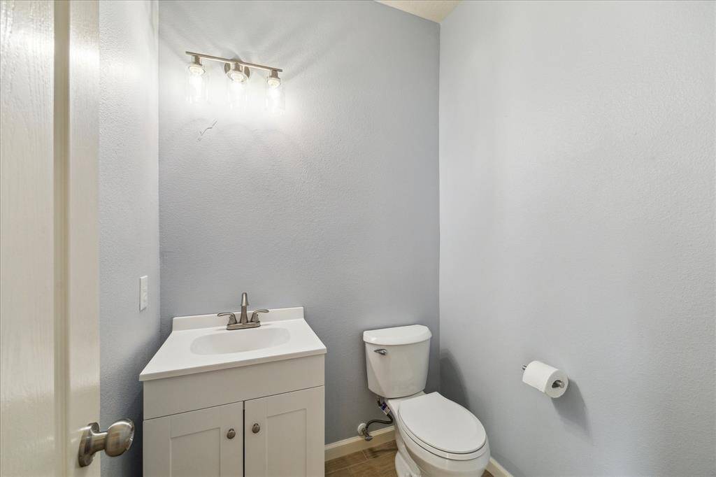 Half bath downstairs. New mirror has been installed