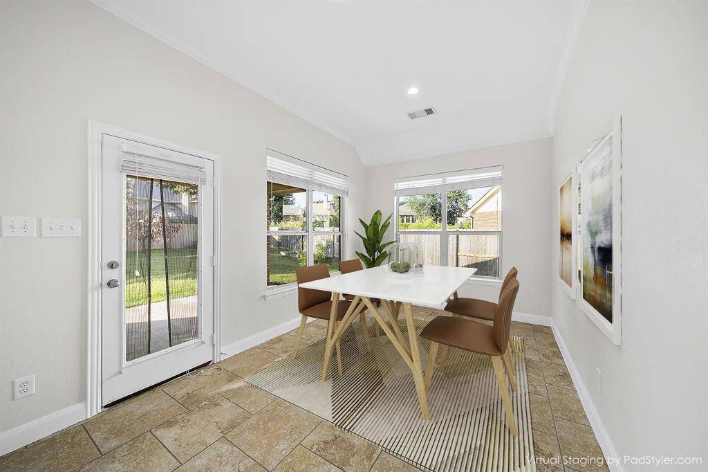 Breakfast area has the perfect space for a secondary table or make it your own craft area with the kids!