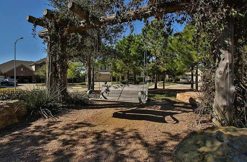 Park in Front of the Home with swing providing serenity and peace