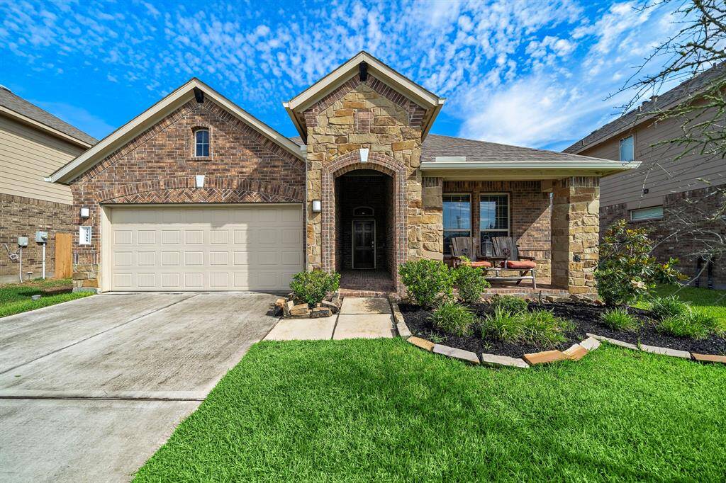 Welcome home to charming curb appeal with a welcoming front entry that sets the tone for what’s inside. The covered front porch offers a cozy sitting area—perfect for morning coffee or relaxing evenings.