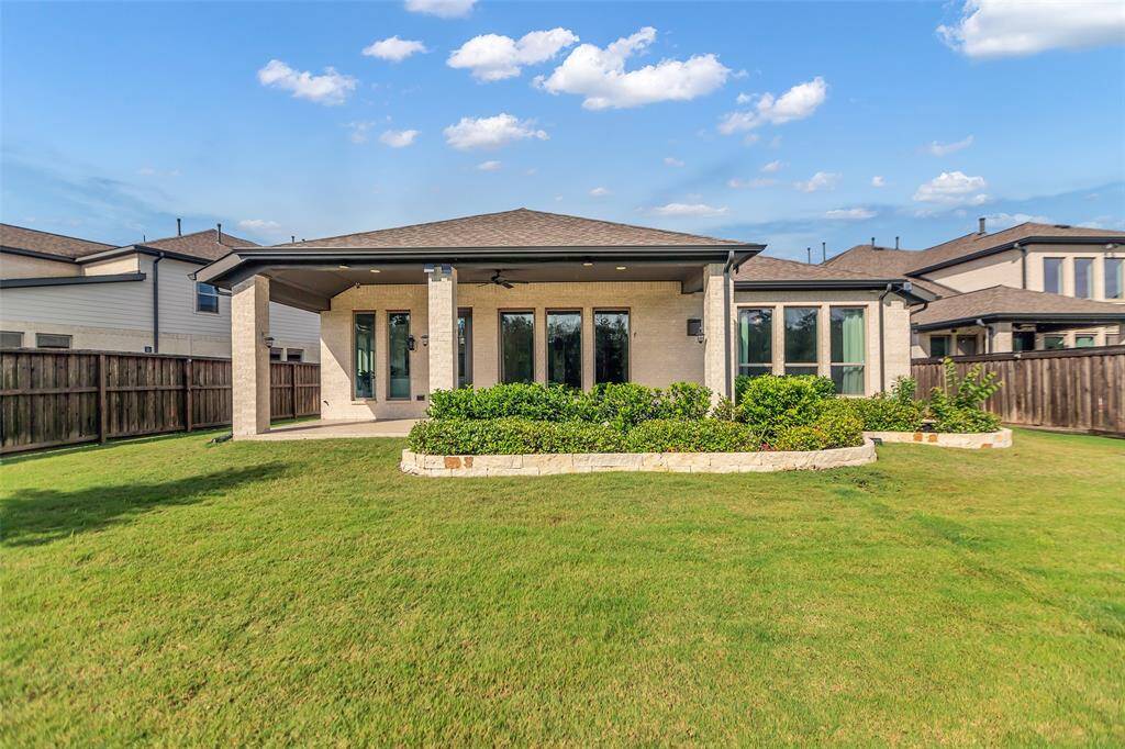 Bath 2 serves two secondary bedrooms.  As with all the features of this home, this bath is designed with luxury in mind.  It features an oversized shower with tile surround and quartz countertops as well as being accented with stylish and modern hardware.
