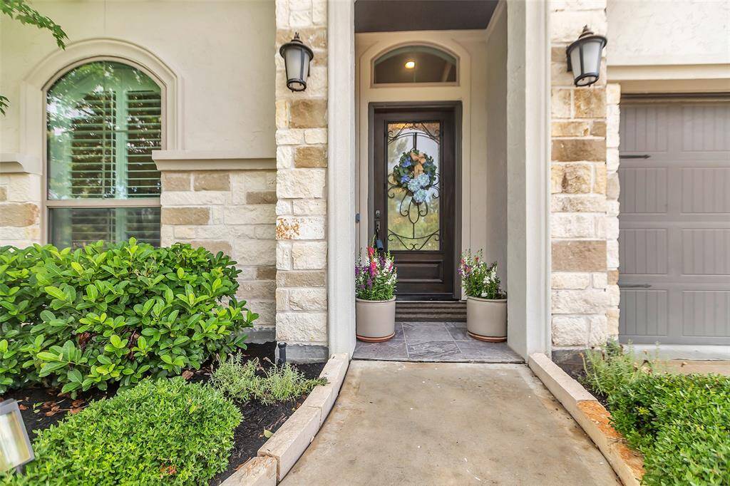 An inviting entry welcome you to 28249 Woodland Bend Way...Welcome!