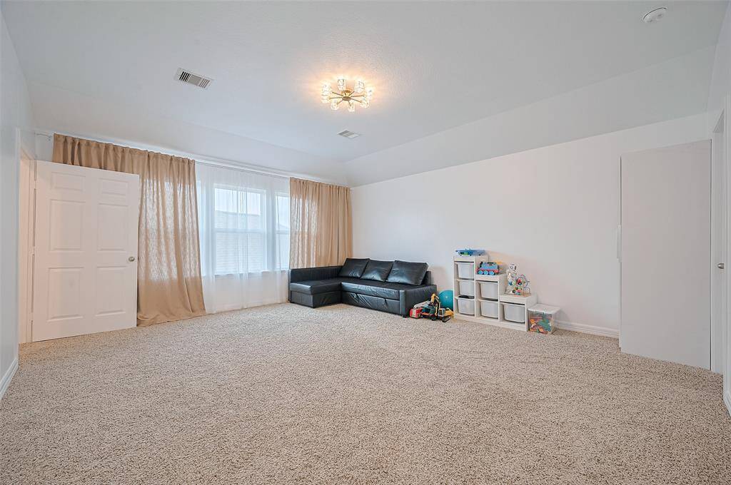Bathed in natural light from generous windows, this expansive upstairs space adapts with ease. Whether it becomes a studio, guest retreat, or creative headquarters, its potential is as open as its floor plan.
