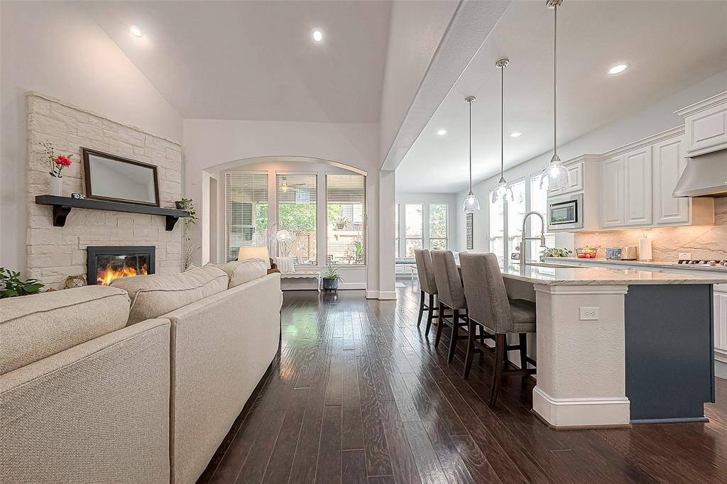 Large open concept living room and kitchen.  Very large island, brand new kitchen sink faucet, and undercabinet lighting.  Smart lighting included throughout major parts of house.