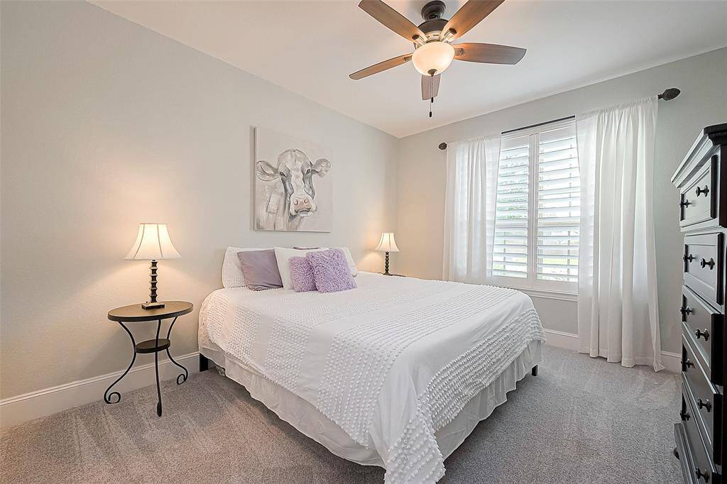 Large downstairs guest bedroom.  Option to leave all furniture seen pictured (excluding mattress).  King-size mattress pictured for reference.