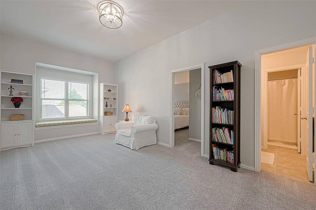 Upstairs lounge area between two upstairs bedroom.  Large full bath with double sinks.