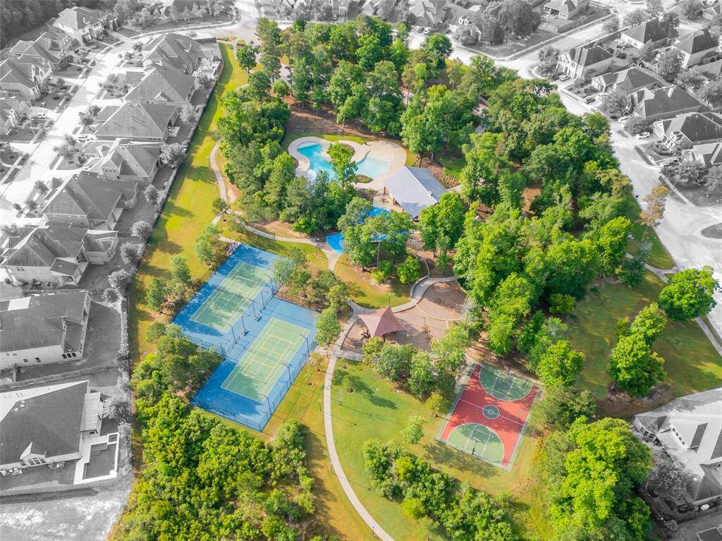 Barefoot Park within short walking distance from house.  Includes 2 lighted tennis/pickleball courts, basketball court, playground, splash pad, and large pool.