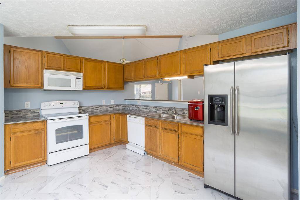 Kitchen area with updated flooring