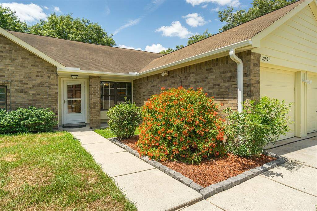 Beautiful landscaping leading up to the front door