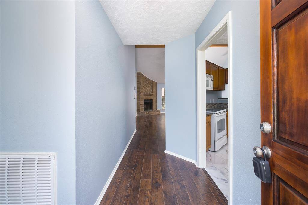 Entryway, kitchen to your right. Updated flooring!