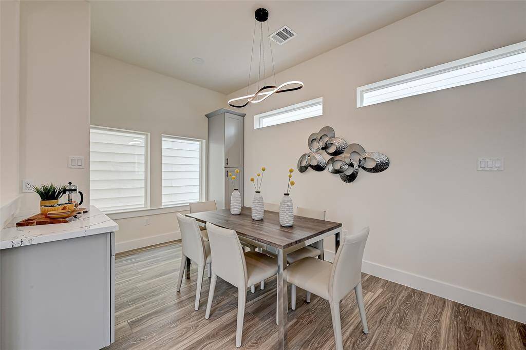 Breakfast/ dinning area.(Previously staged.)