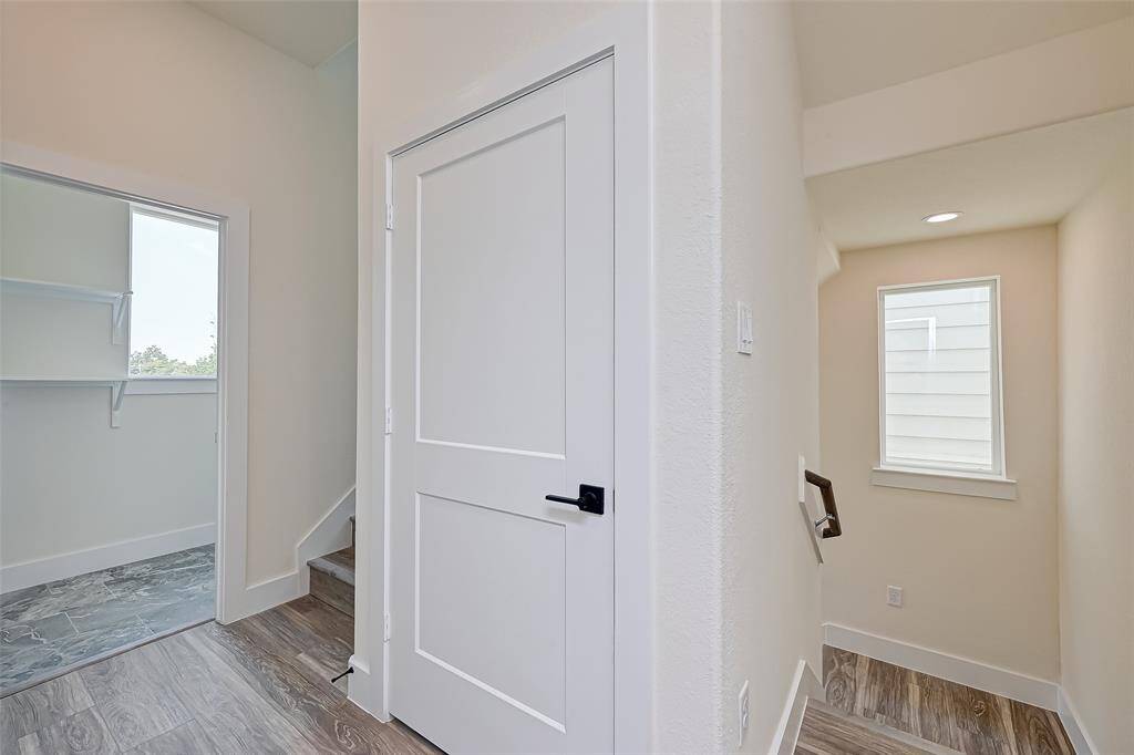 3rd Floor: Hall way to the utility room with extra storage or future elevator. It is elevator shaft ready.