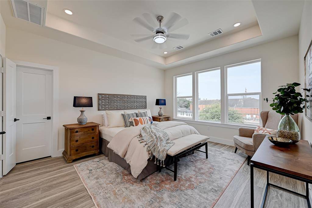 3rd floor: Primary ensuite with lots of natural lighting and walk in closet. (Previously staged.)