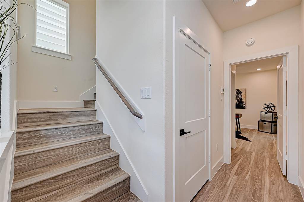 1st floor entrance with 1 bedroom with a full a bathroom.