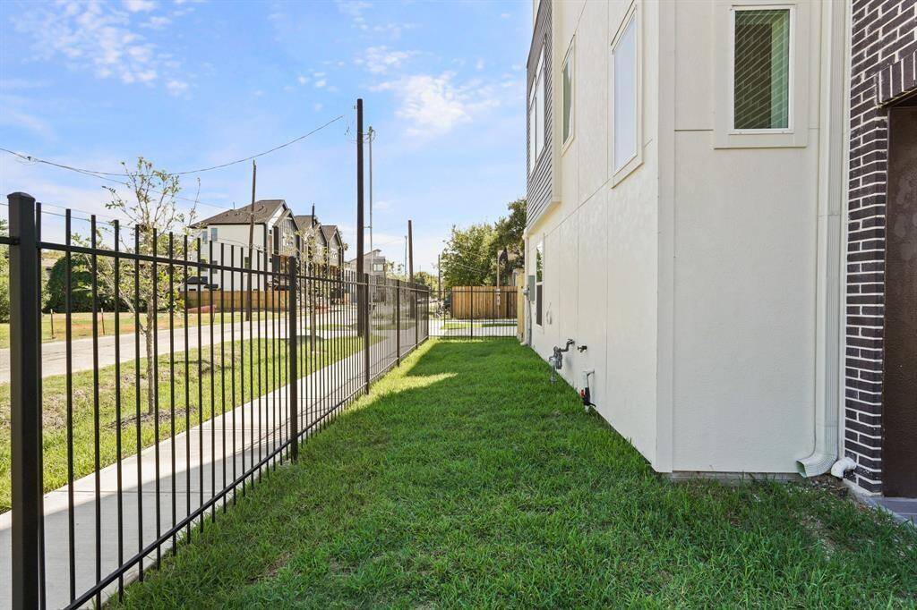 Front gated side yard space.