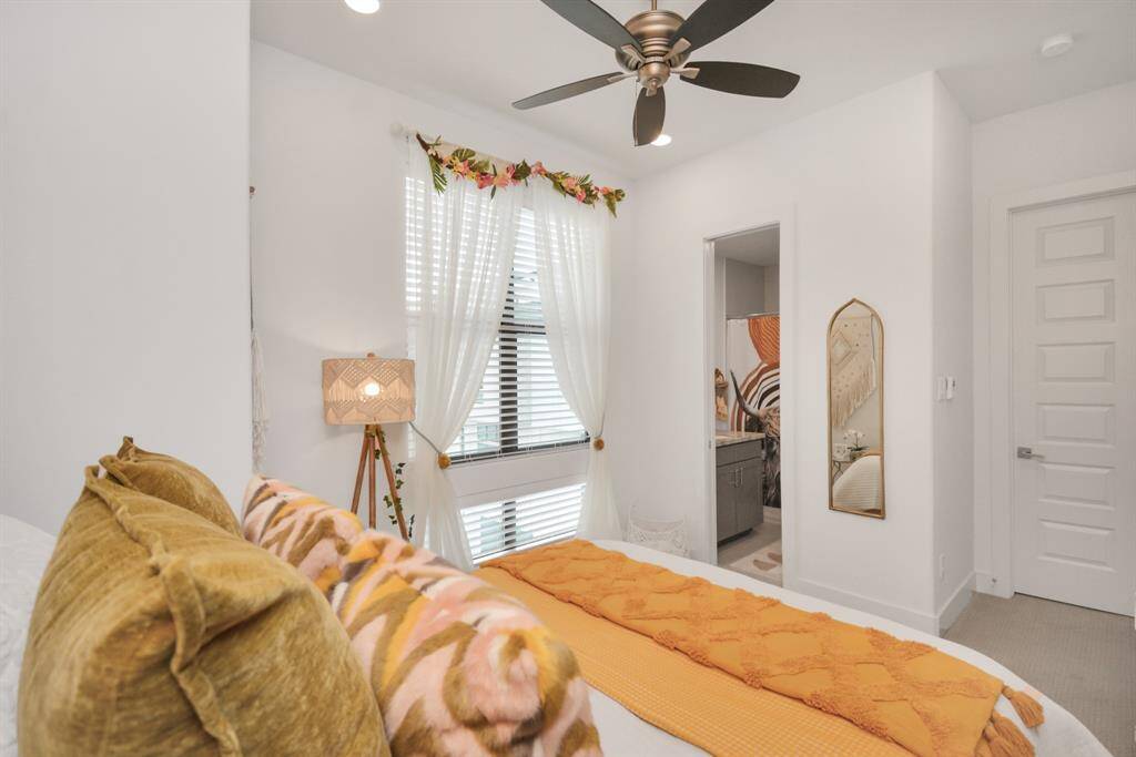 Luxurious third-floor bedroom with en-suite bathroom and a walk-in closet.