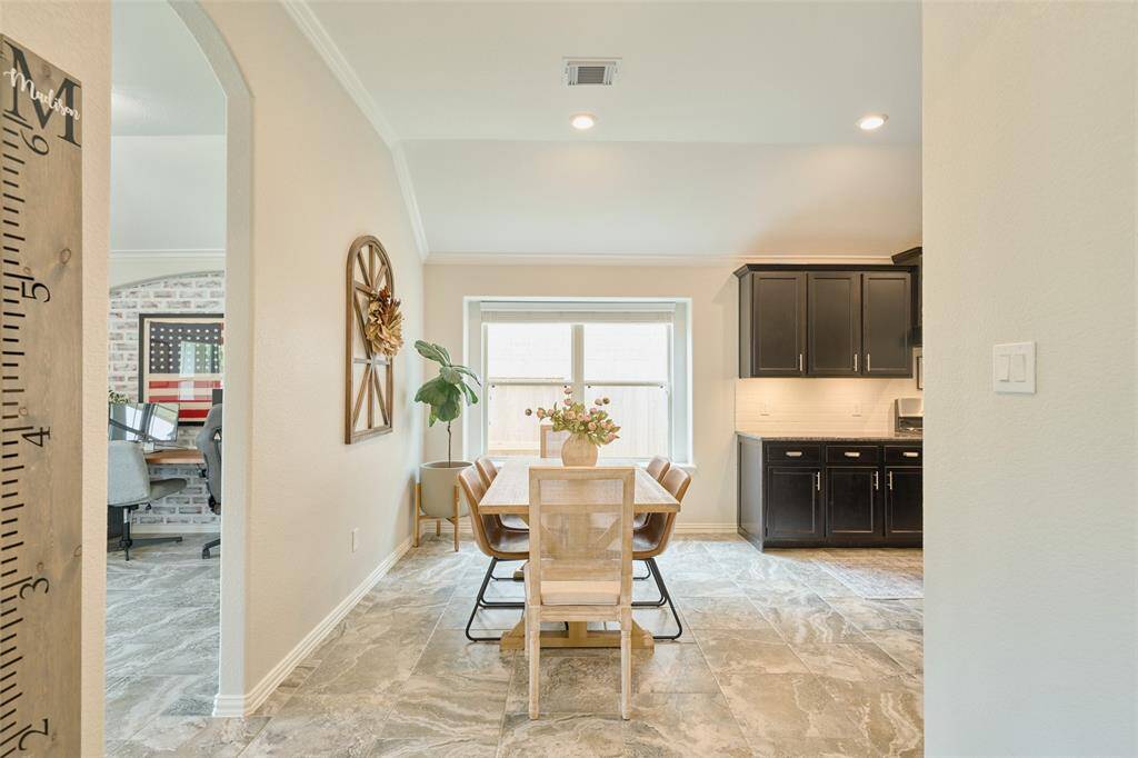A nice transition into the kitchen/breakfast area or continue on to the living room.