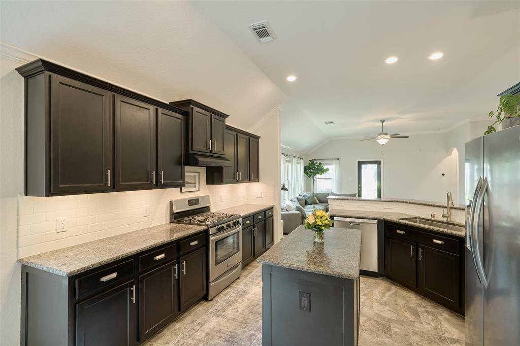 Plenty of cabinets and storage - love the pull out trash feature.