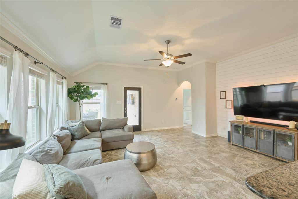 Nice shiplap accent wall, it really dresses up the room.