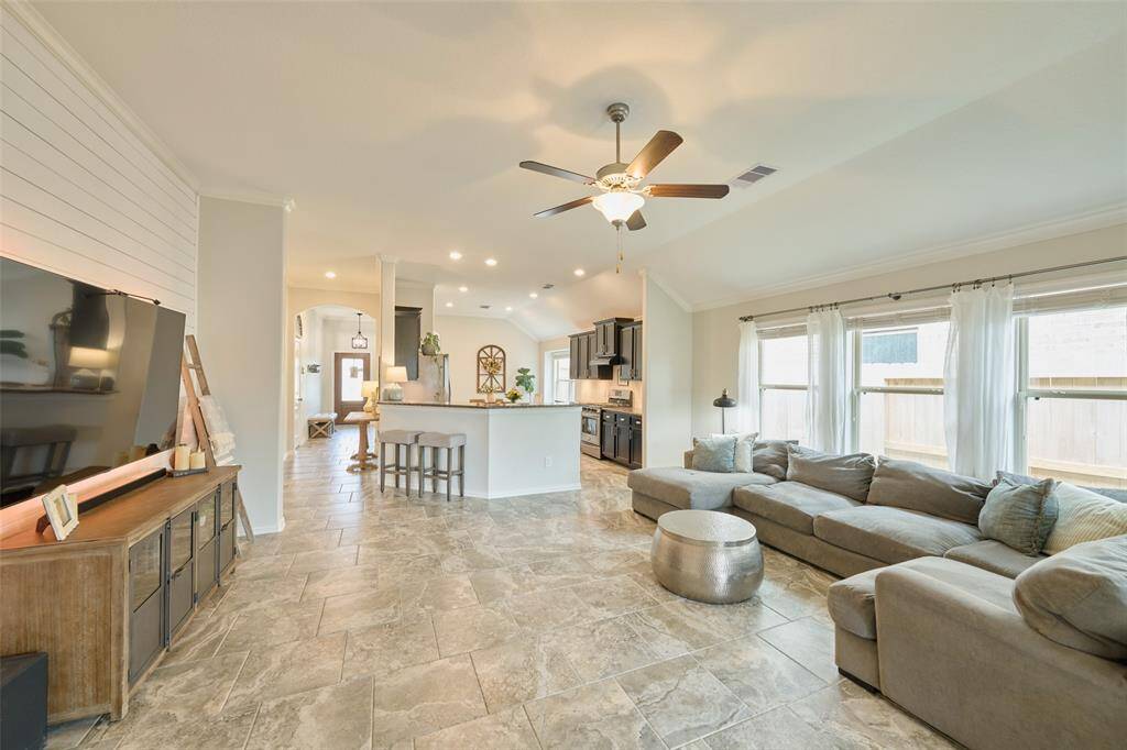 Take time to notice all the upgraded lighting and fixtures throughout this home.