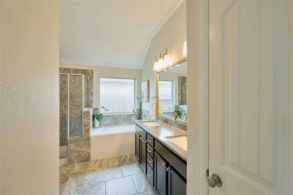 Double sinks and more upgraded fixtures.