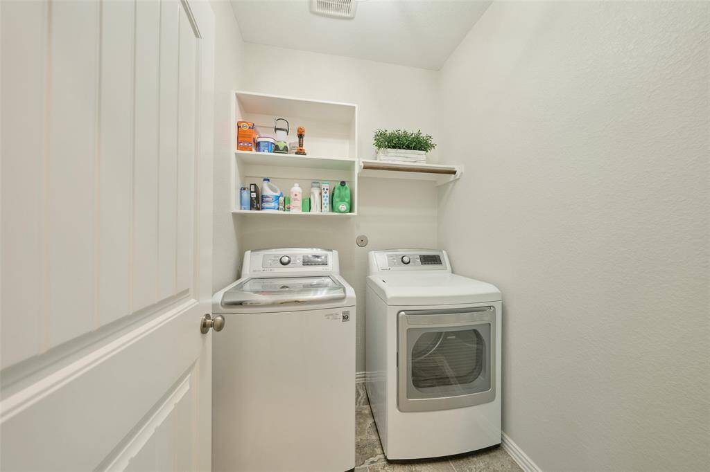 Enjoy a dedicated laundry room - close the door and it is hidden!