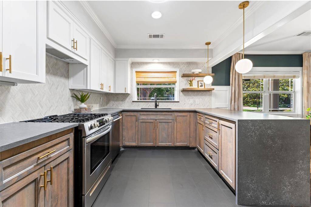 Thoughtfully layed out kitchen with sun tunnel for natural light and walk in party not shown