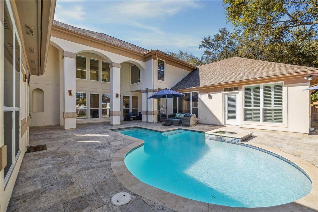 FALL IN LOVE WITH THE 2-STORY COVERED BACK PATIO.