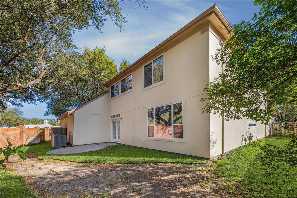 SIDE YARD INCLUDES AN ADDITIONAL PATIO.