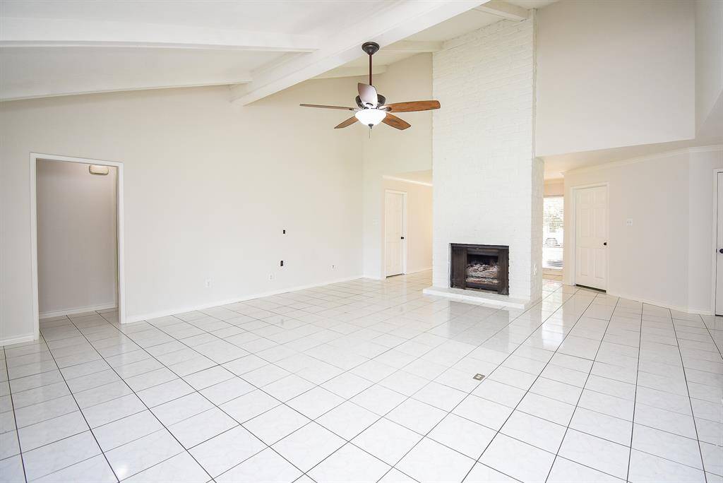 Fireplace has gas logs for those cold winter nights.  Ceiling fan for our summer nights.