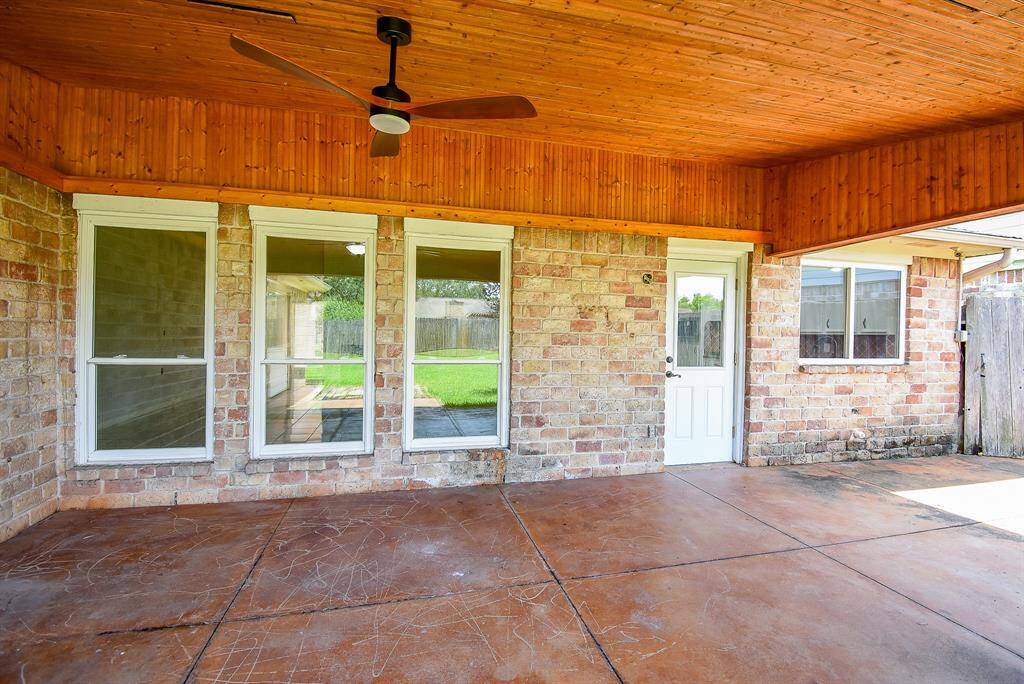 Fabulous bead board ceiling complete with fan.  This also gives you a good look at the double paned windows