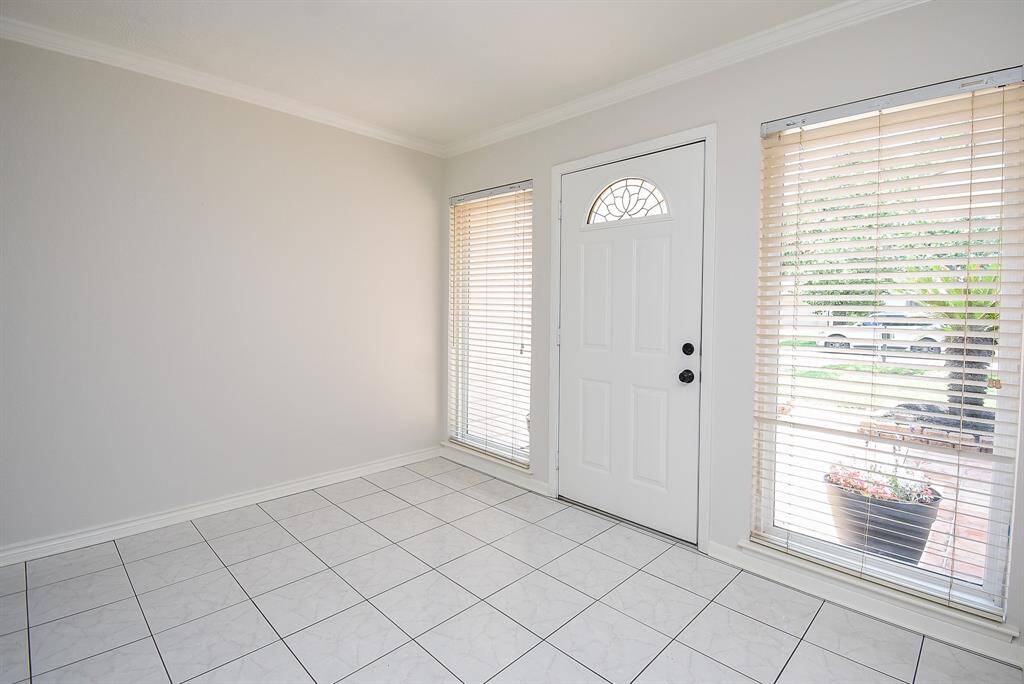 Light and bright entry greets you as you come in front door