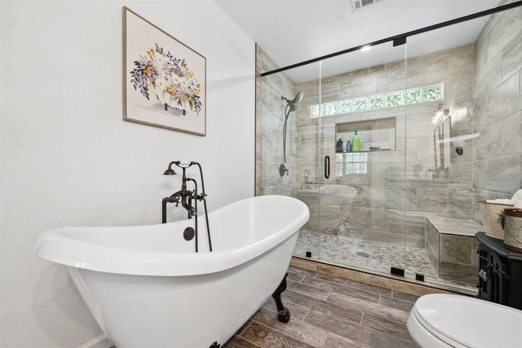 Primary Bathroom with updated shower and Standalone soaking tub