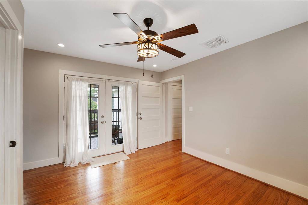 This spacious hallway seamlessly connects the main home to a versatile one-room efficiency and a separate one-bedroom apartment—ideal for multi-generational living, guests, or rental potential!
