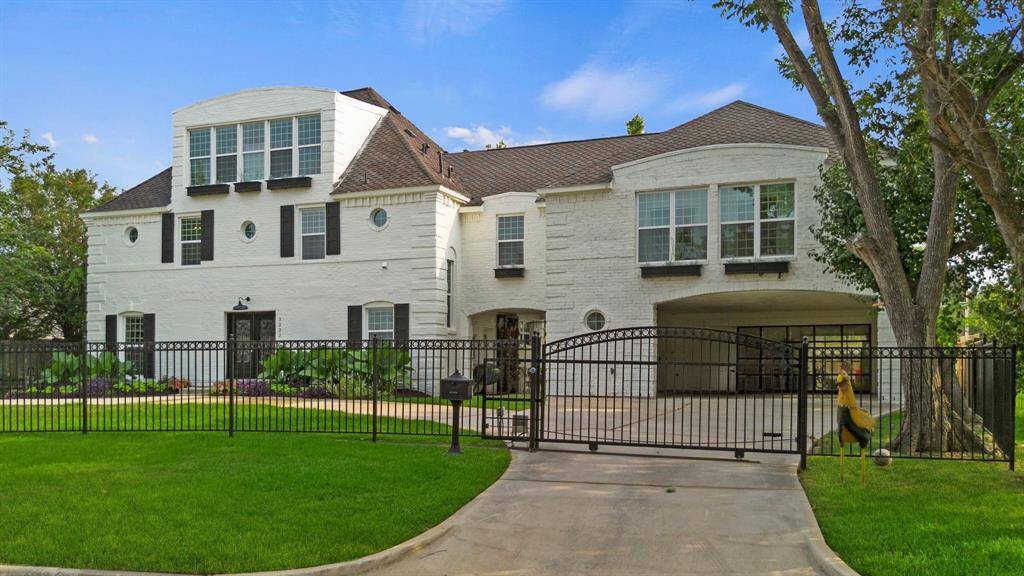 This gorgeous home features a gated driveway offering added security and privacy, additional parking space for guests, and an attached 2-car garage for everyday convenience.