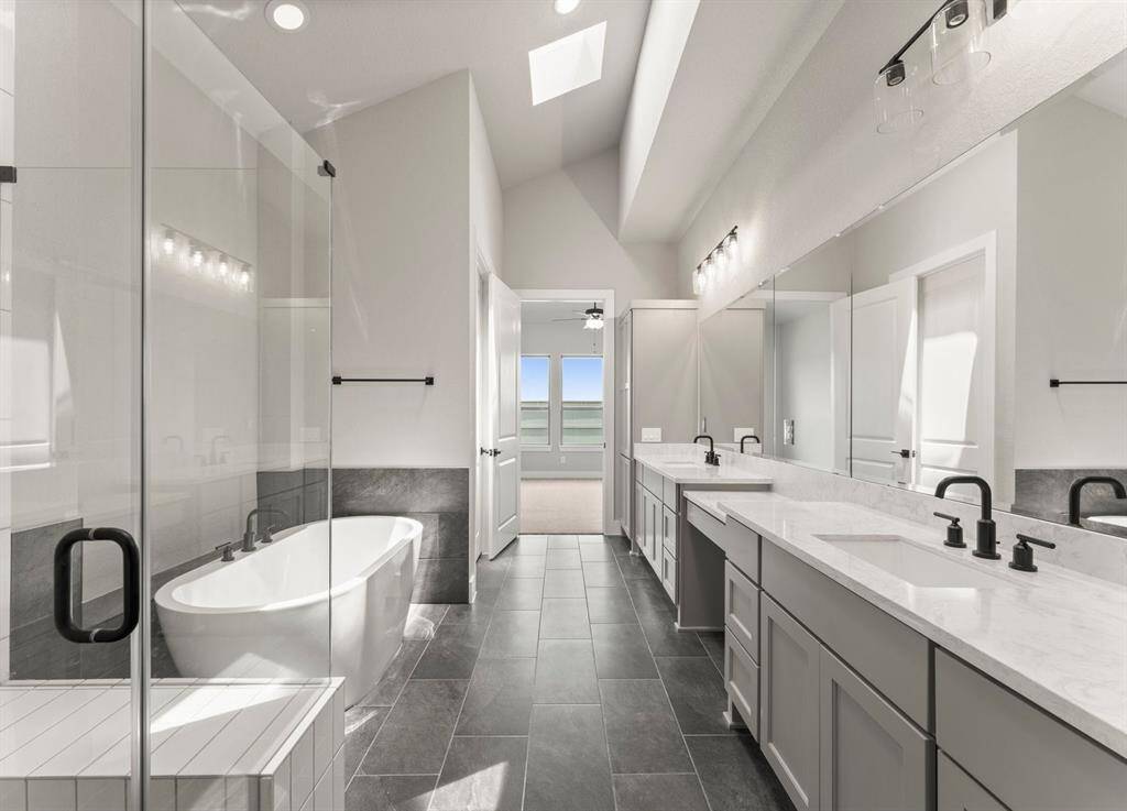 Primary Bath with Skylight, Double Sinks, and Built-in Make-up Vanity
